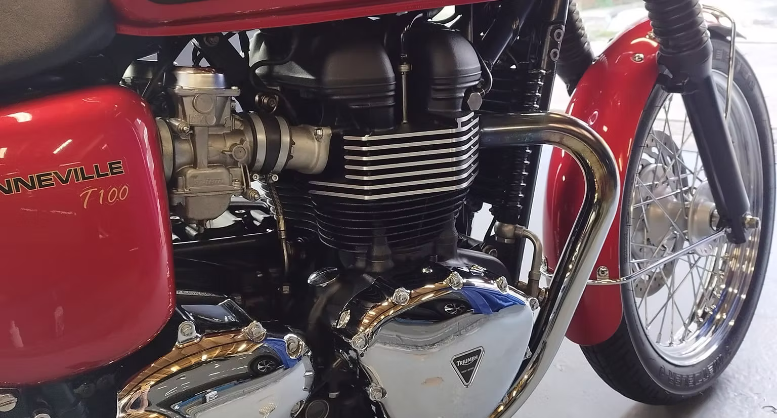 Triumph Bonneville T100 engine and exhaust — polished and detailed